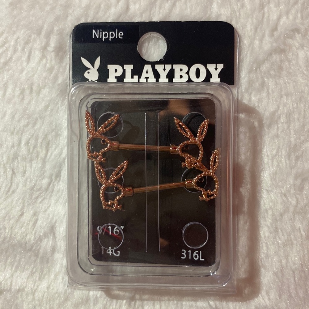 Playboy nipple piercings